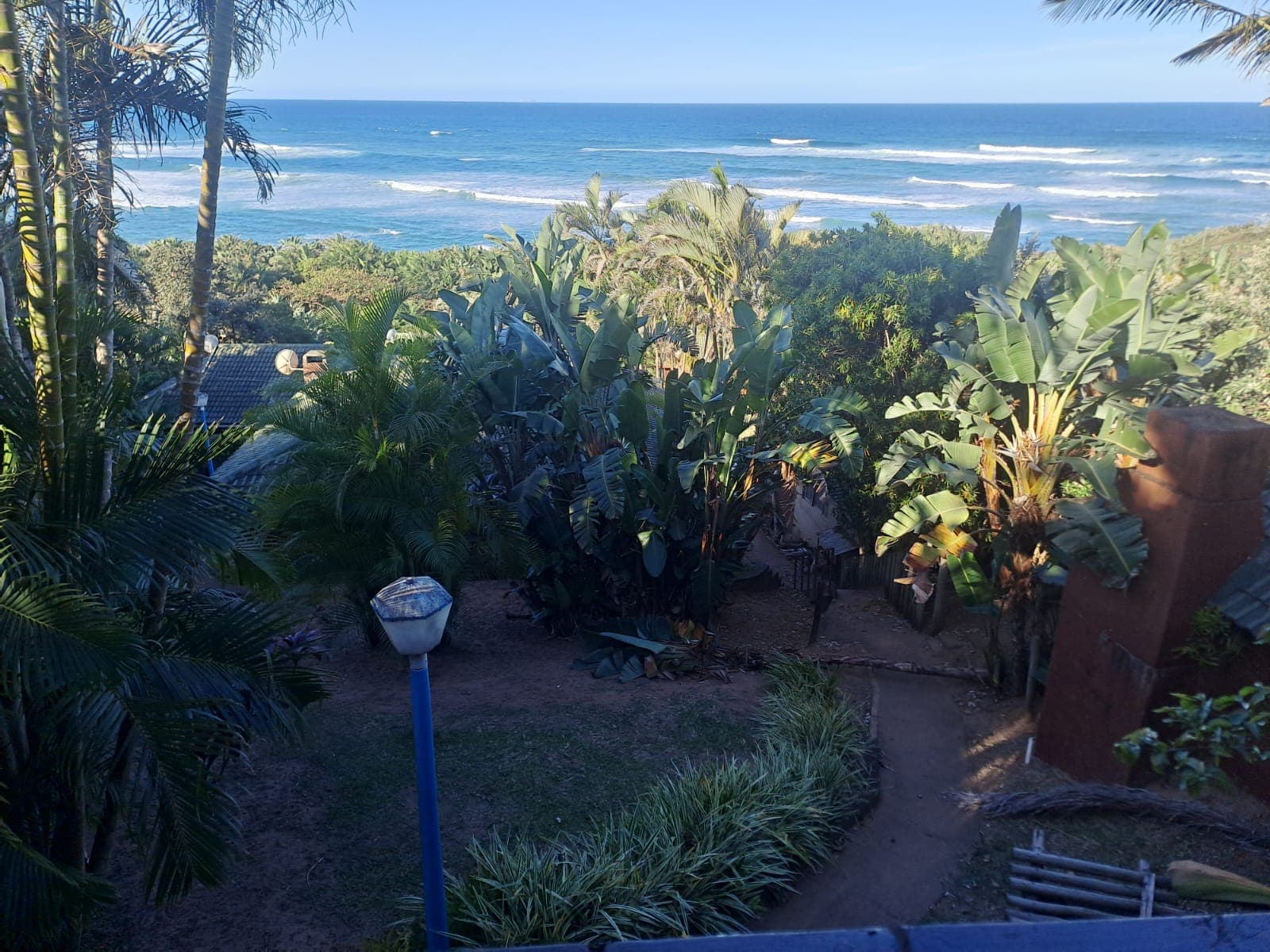 Elevated view over the gardens to the sea